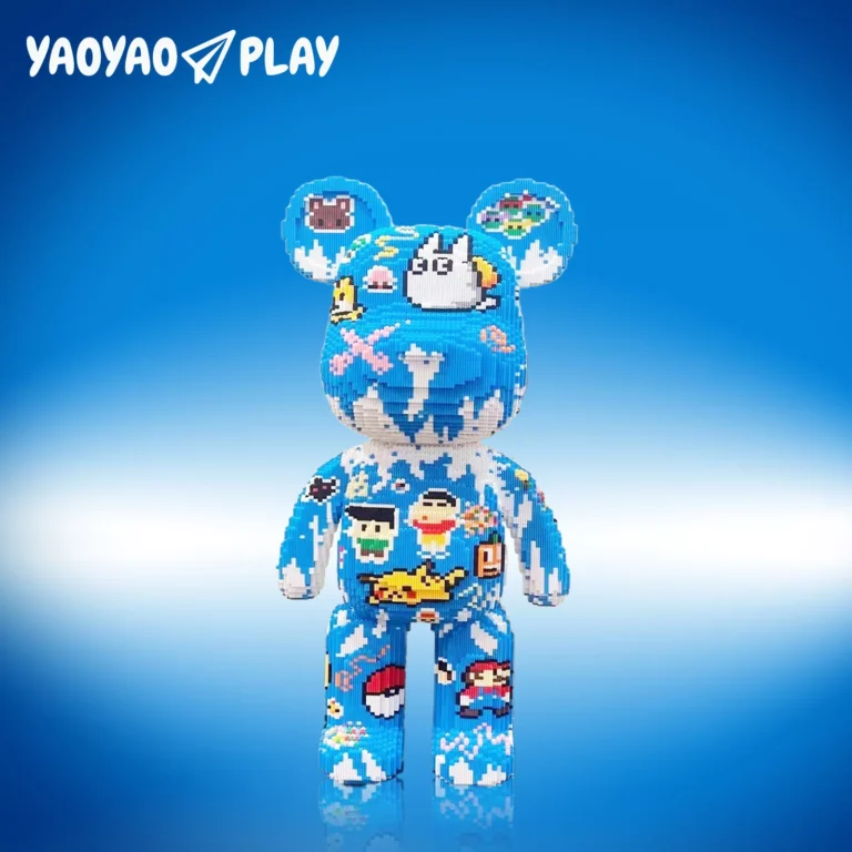 Blue ​​Brick Bear toy​​ featuring 8-bit bird, cat, and creature decals on gradient ​​building blocks​​ base.