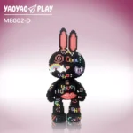 A black ​​Brick Bear toy​​ with neon heart, cloud, and text motifs on a lavender-to-pink gradient backdrop.