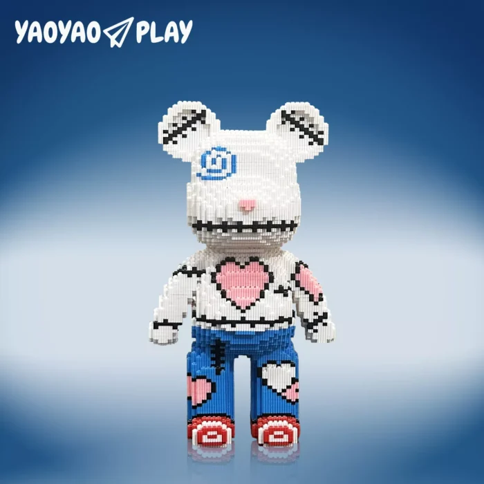 Blue-and-white building blocks brick bear toy (12.6-inch height) with stitched face, heart motifs, and 'YAOYAO PLAY 4500PCS' branding